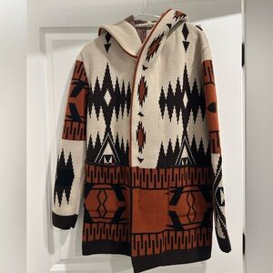 Beautiful coat , never worn it was a gift , selling bc it’s not really my style